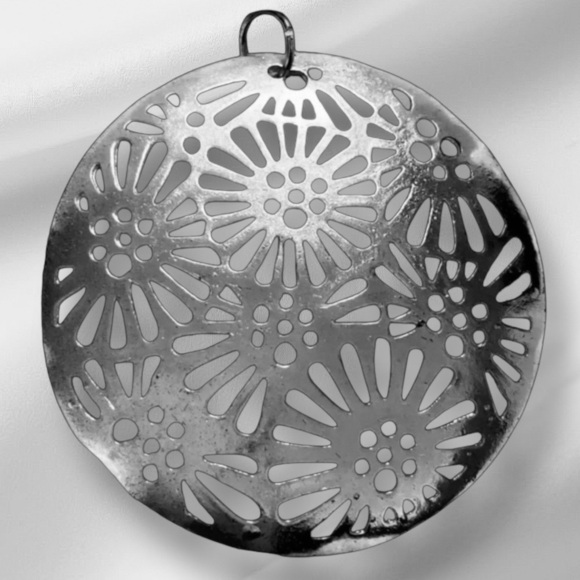 Silver Tone Large Round Pendant Featuring a Flower Cutout Design (no necklace) - Picture 1 of 3